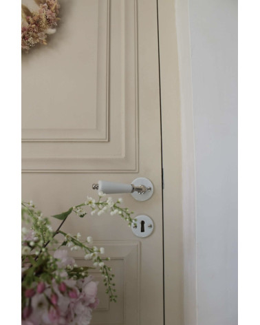 Poignée de porte canon nickelé en porcelaine blanche Merigous