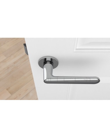 Poignée de porte Classique ARIA poignée design couleur 4 vue de haut montée sur une porte