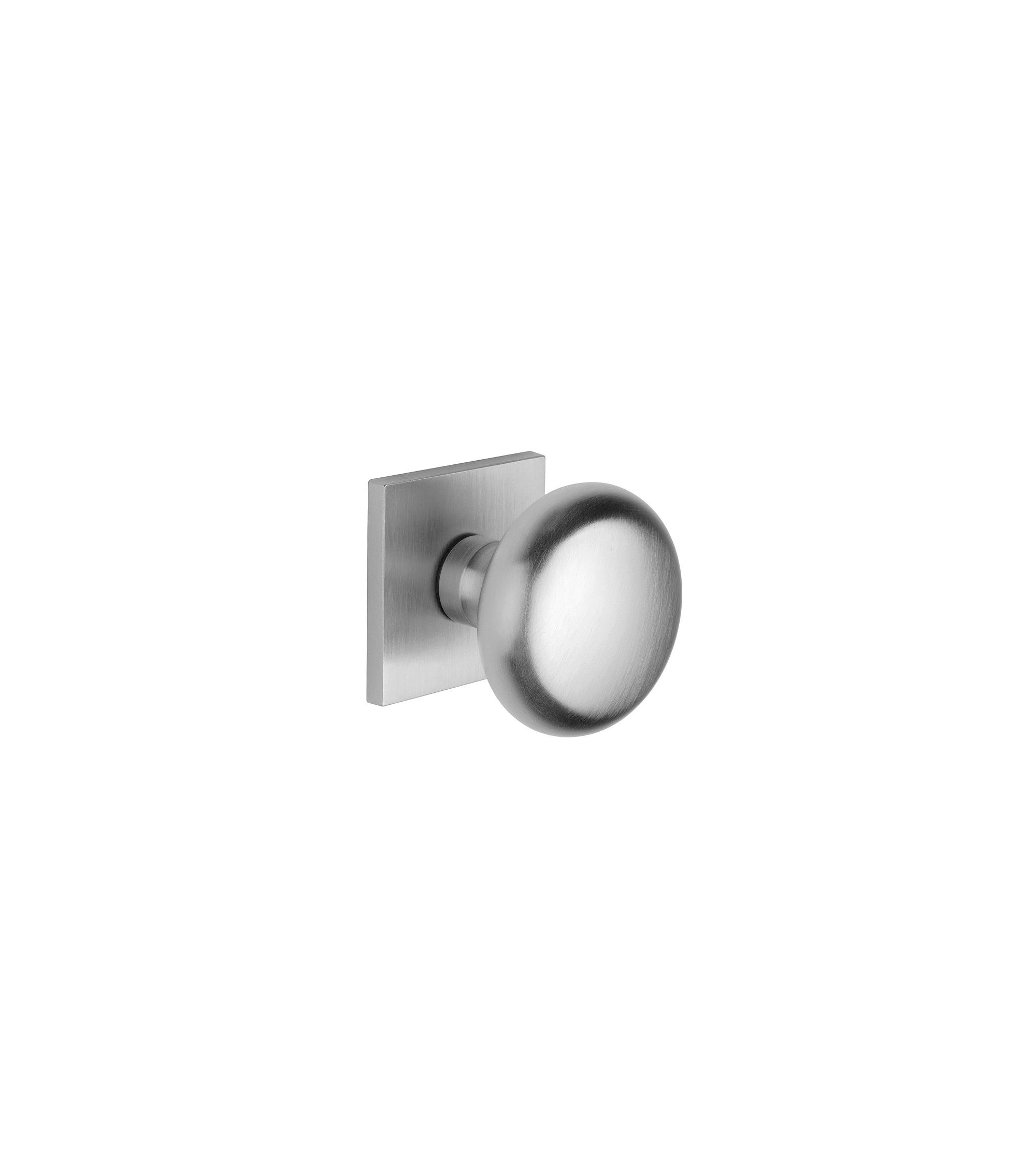 design door knob in satin chrome on a square backplate