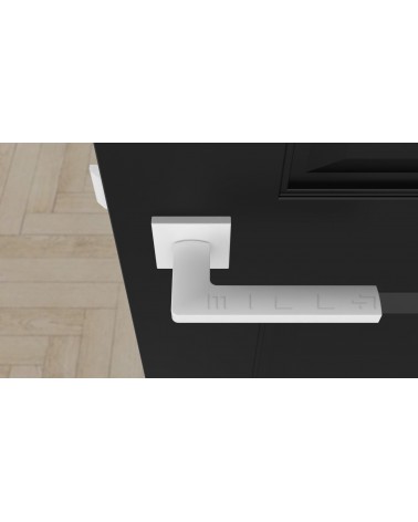 Poignée de porte PYROLA quincaillerie design couleur 4 vue de haut montée sur une porte