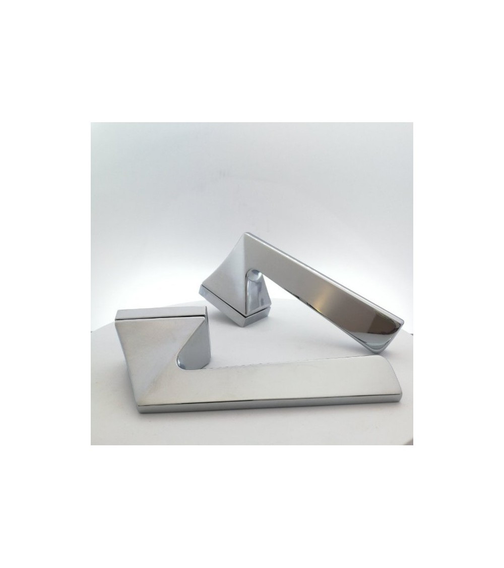 elegant brushed chrome door handle seen from the side and from above