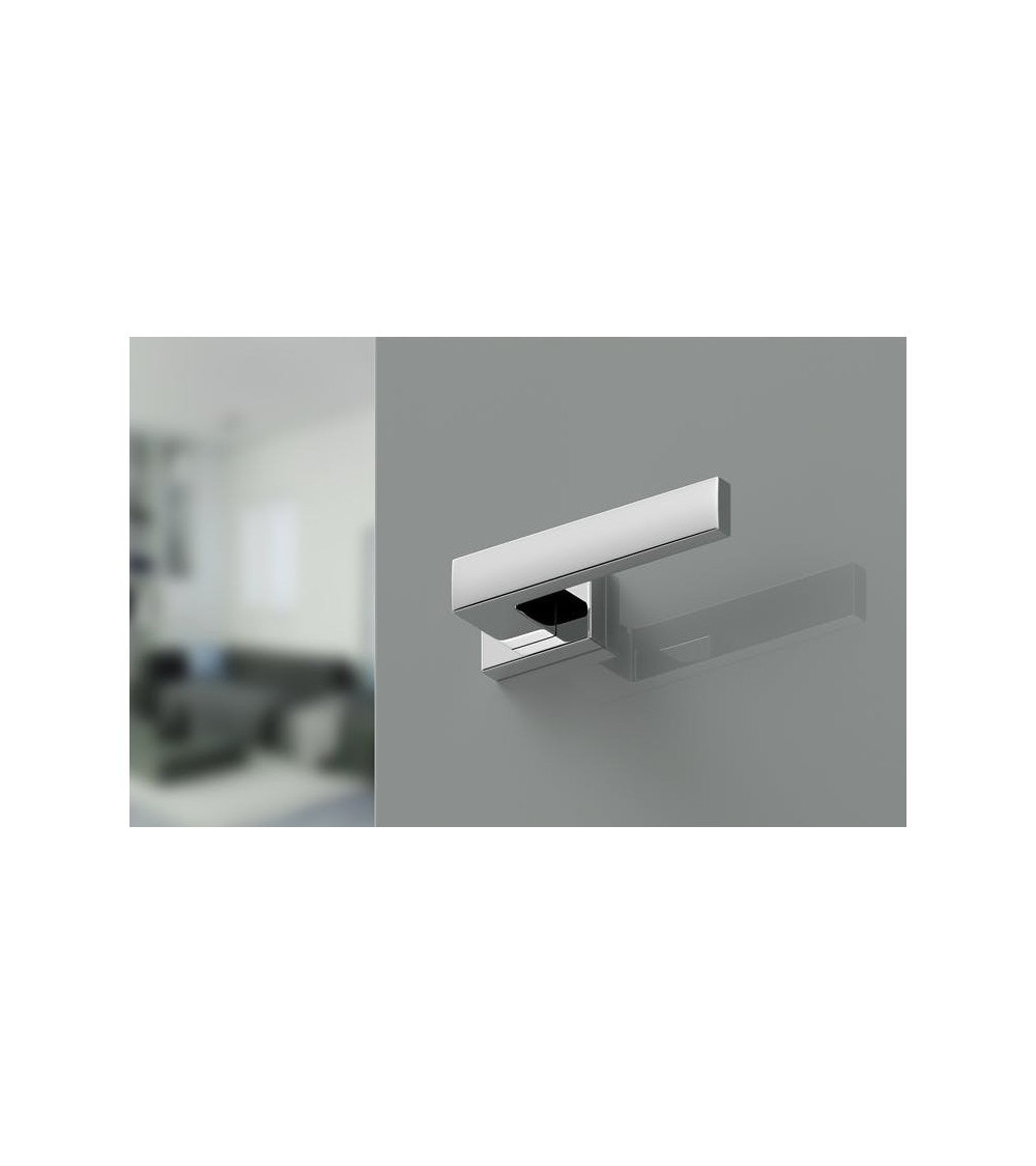 polished chrome rectangular handle on an office door