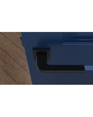 Poignée de porte noire ISMENA poignée design vue de haut montée sur une porte
