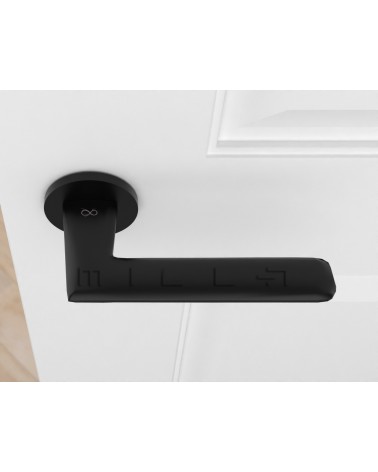 Poignée de porte noire Line GIULIA poignée design vue de haut montée sur une porte