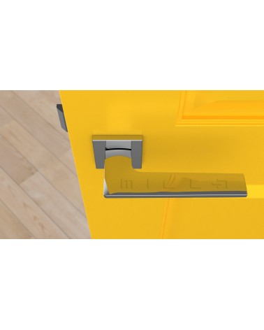 Poignée de porte en zamak LUNARIA poignée design couleur 2 vue de haut montée sur une porte