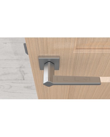 Poignée de porte en zamak NINFEA poignée design couleur 2 vue de haut montée sur une porte