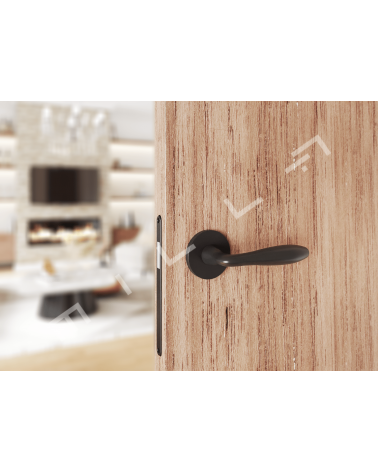 Poignée de porte en zamak VERBENA poignée design montée sur une porte motif bois