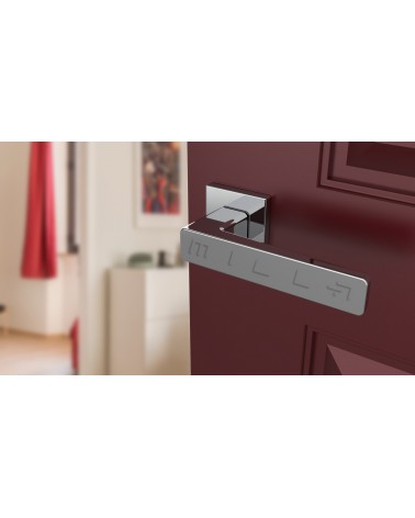Poignée de porte en zamak ERICA quincaillerie design couleur 1 vue de haut inclinée montée sur une porte