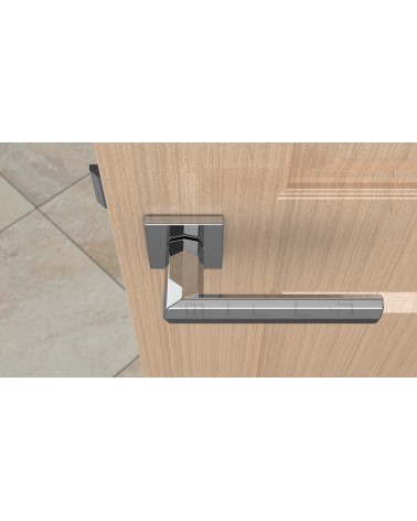 Poignée de porte en zamak FRESIA poignée design couleur 1 vue de haut inclinée montée sur une porte