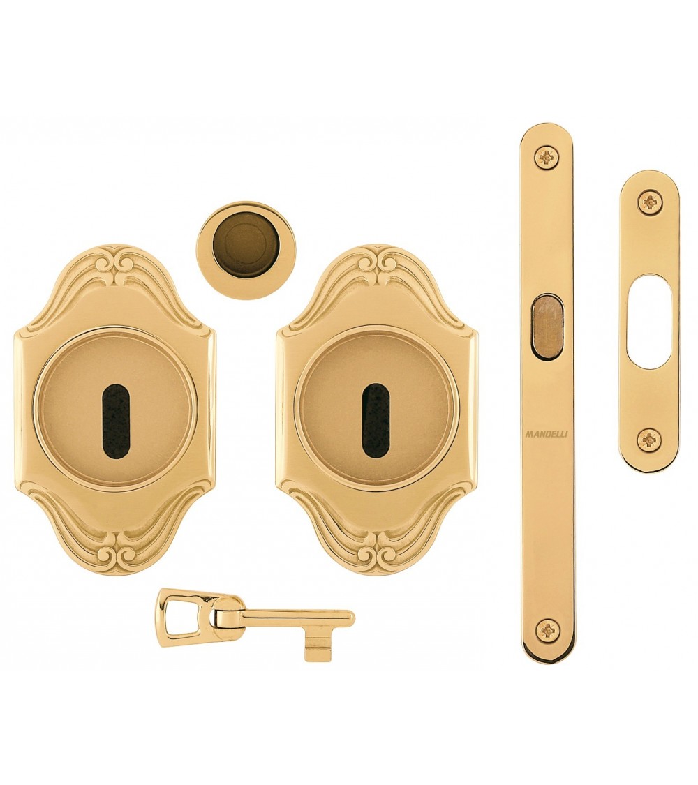 Recessed door handle for sliding door with privacy key lock in polished gold finish, made in brass
