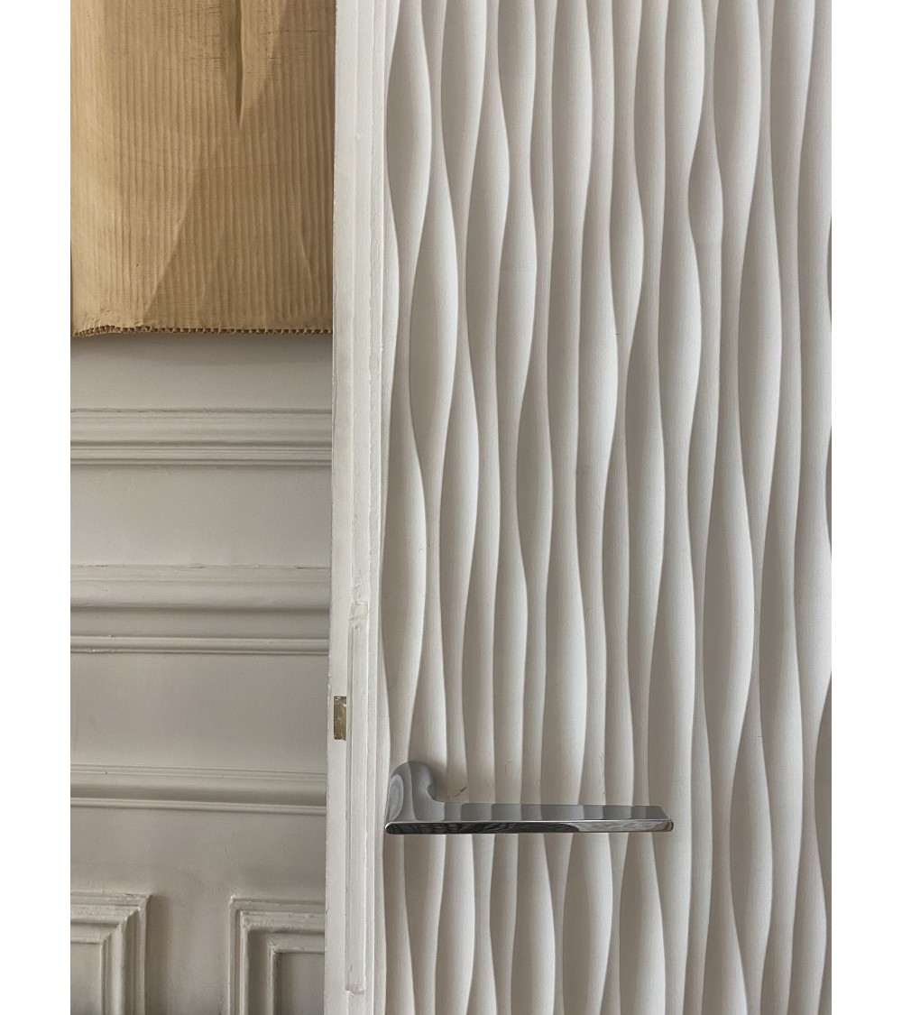 Futuristic door handle for a design office