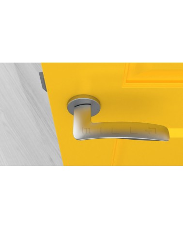 Poignée de porte en zamak ROBINE quincaillerie design couleur 3 vue de haut montée sur une porte