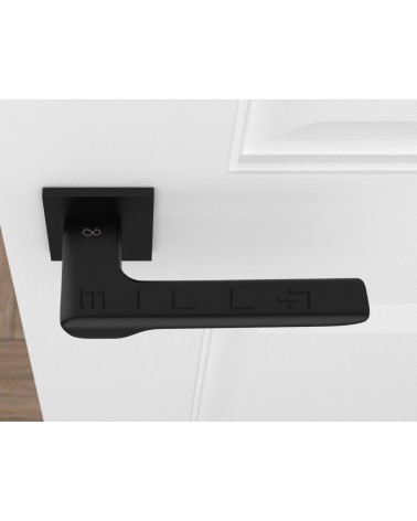 Poignée de porte matière zamak LIGNE poignée design vue de haut montée sur une porte