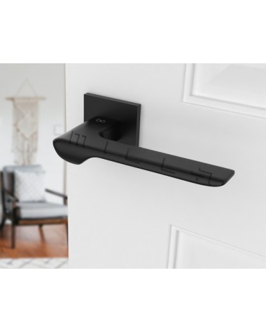 Poignée de porte matière zamak LIGNE poignée design vue inclinée montée sur une porte