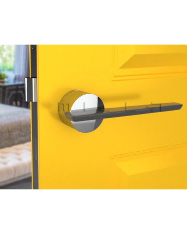 Poignée de porte en zamak JUMELLE poignée design vue de face montée sur une porte
