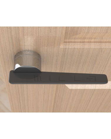 Poignée de porte en zamak JUMELLE poignée design vue de haut montée sur une porte