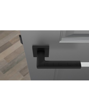 Poignée de porte PYROLA quincaillerie design couleur 5 vue de haut montée sur une porte