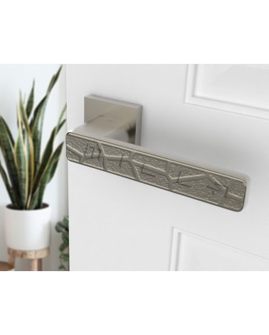 Poignée de porte en zamak Volare poignée design vue inclinée