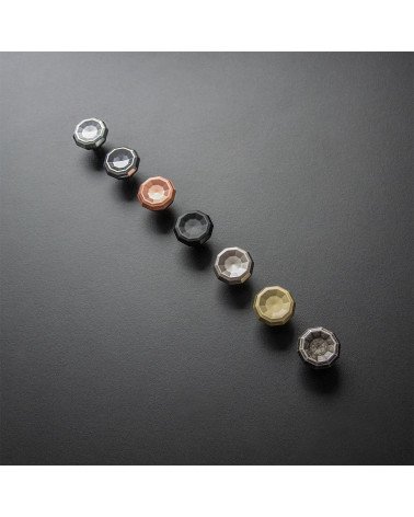 Bouton de meuble CAMPANA poignée design alignés sur une surface noire