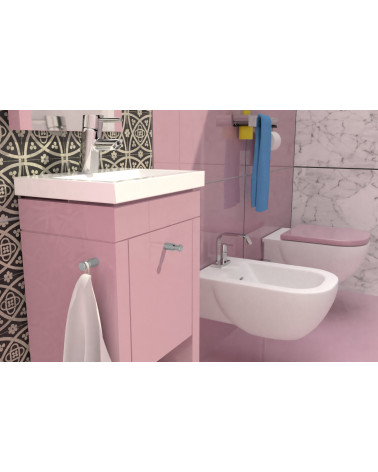 Bouton de meuble CARTAGENA poignée design fixé sur un meuble rose dans une salle de bain