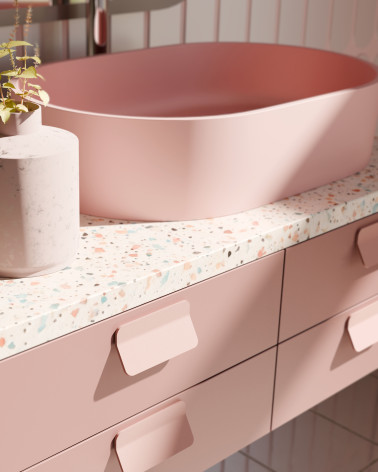 Poignée de meuble rose poudré SEA poignée design montée sur un meuble de salle de bain