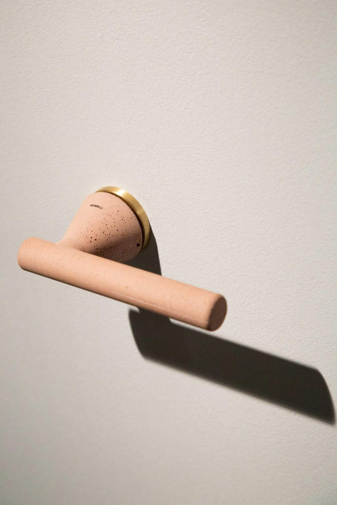 Designer interior door handle in powder concrete colour
