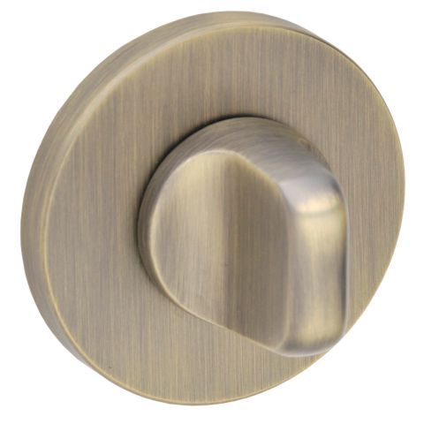 Round WC door rosette in bronze from milla poignée — a vintage style
