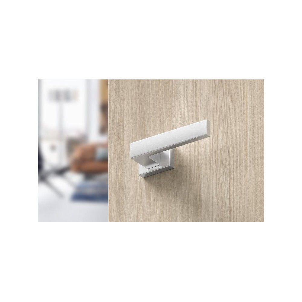 Modern interior handle for a contemporary style on a cream beech or ivory-finished ash door